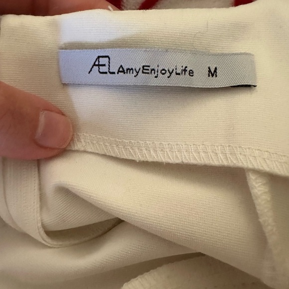 Elegant White Dress with Ruffle Hem - Picture 7 of 7